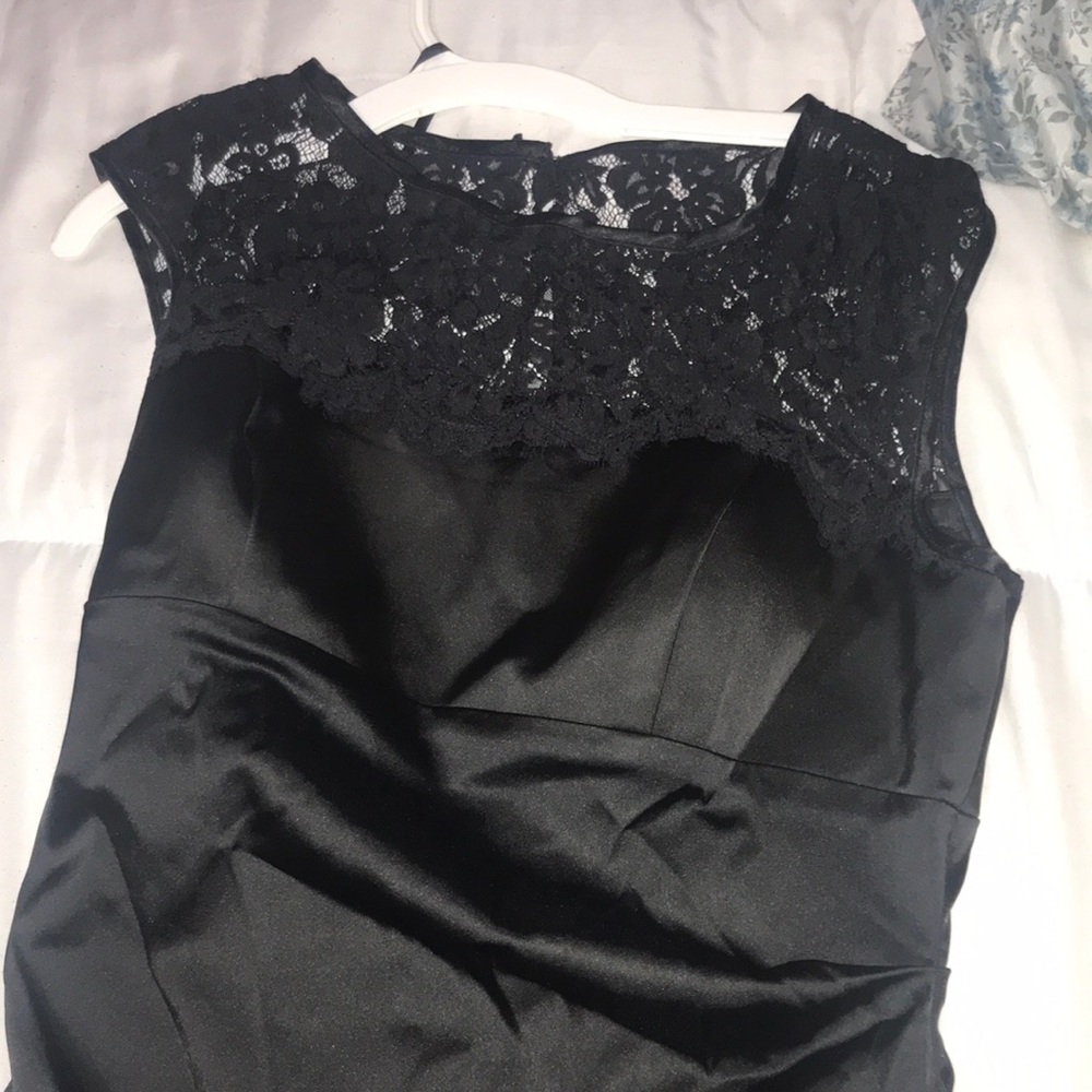Xscape brand from Macy’s. Brand new black dress with tags still attached.